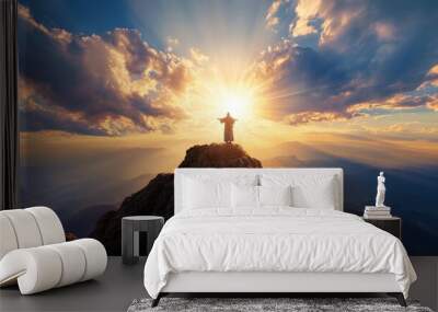 close up Jesus Christ standing on a mountain, overlooking the world below, with rays of light shining down Wall mural