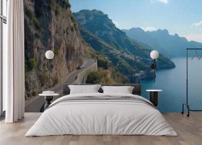 The coastal cliffs and winding roads of the Amalfi Coast, Italy, bathed in day light Wall mural