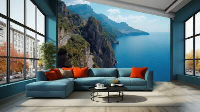 The dramatic coastal cliffs and winding roads of the Amalfi Coast, Italy, bathed in day Wall mural