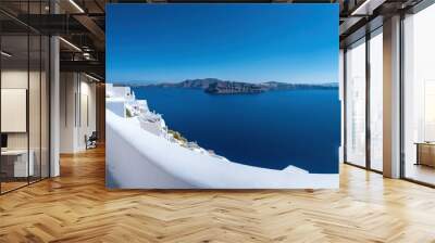 The panoramic view of Santorini white washed buildings overlooking the deep blue Aegean Sea, Greece Wall mural