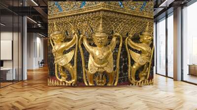 Golden Garuda statues at Wat Phra Kaew Wall mural