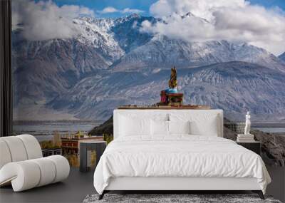 The Maitreya Buddha statue with Himalaya mountains in the background from Diskit Monastery or Diskit Gompa, Nubra valley, Leh Ladakh Wall mural