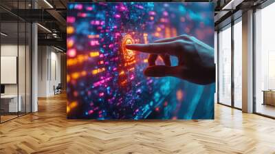 Close-up of a hand interacting with a vibrant, glowing digital interface, highlighting advanced technology and colorful data in a futuristic environment. Wall mural