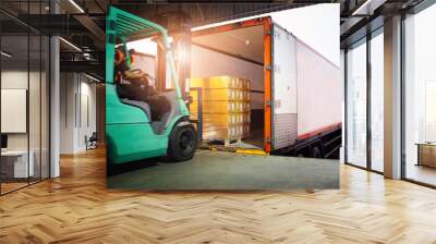 Forklift Tractor Loading Package Boxes into Cargo Container. Cargo Trailer Truck Parked Loading at Dock Warehouse. Shipment Delivery Service. Shipping Warehouse Logistics.  Freight Truck Transport.	 Wall mural