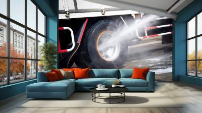 High Pressured Water Washing  a Truck Wheels and Tires.  Wall mural