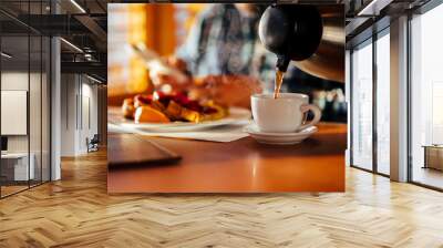 Waitress Pouring Fresh Coffee At A Classic Breakfast Diner Wall mural