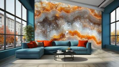 A close-up shot of a banded agate geode with a white and orange mineral formation in the center and a band of quartz crystal. Wall mural