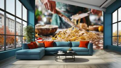 hand cooking food pasta.on top table Wall mural