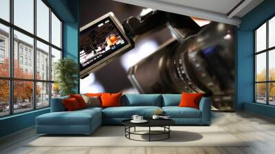 digital video camera viewfinder with focus on digital screen to represent on set camera equipment and media concepts Wall mural