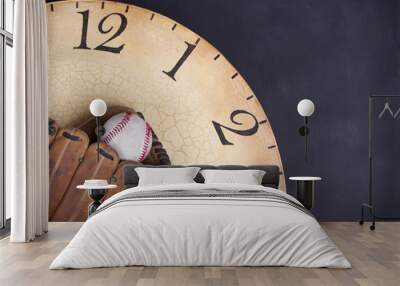 A baseball and mitt on an old vintage clock Wall mural