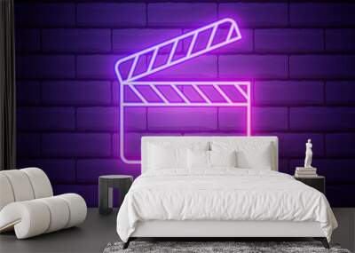 glowing neon movie clapper icon isolated on brick wall background. film clapper board icon. clapperb Wall mural