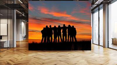 A group of friends standing in silhouette against the backdrop of an open field, arms around each other's shoulders as they gaze towards a beautiful sunset Generative AI Wall mural