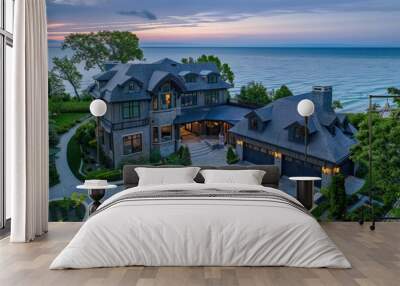 Aerial view of the exterior of a large luxury home with an attached garage on the lake Michigan shore in a scenic neighborhood with a driveway and landscaping Generative AI Wall mural