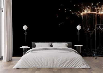 Happy New Year concept with champagne glasses and sparklers isolated on a black background, with copy space for a text banner design Generative AI Wall mural