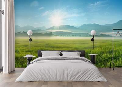 panoramic view of a foggy green meadow with mountains in the background, a blue sky, the sunny morning light Generative AI Wall mural