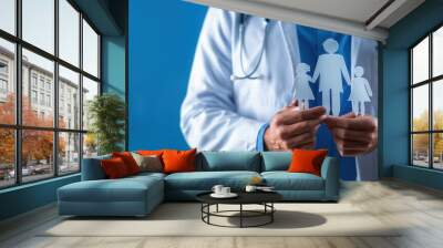 Upside view of doctor in white coat with stethoscope holding family icon on blue background, medical concept banner for health care or life unstoppable social campaign Generative AI Wall mural