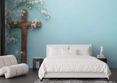 wooden cross and flowers on a light blue background, symbolizing the spiritual aspect of Easter celebration Generative AI Wall mural