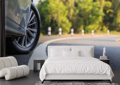 front car wheel on the asphalt road Wall mural