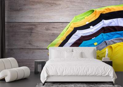 top view of color t-shirt on grey wood plank Wall mural