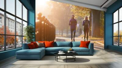 Runners fitness couple jogging in the morning Wall mural