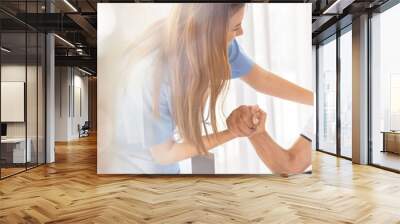 Web banner Man being cared for by a private Asian nurse at home suffering from Alzheimer's disease to closely care for elderly patients with copy space on left Wall mural