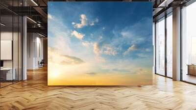 Sky background at sunset,Sky blue and orange light of the sun through the clouds in the sky Wall mural