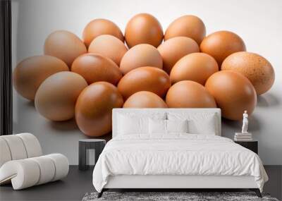 Fresh, organic, and perfectly arranged, a decagon of brown eggs sits elegantly on a pristine white backdrop, evoking a sense of simplicity. Wall mural