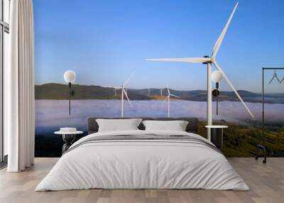 Wind farm in the morning fog. Aerial photography Wall mural