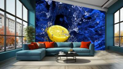 Lemon splashing blue water Wall mural