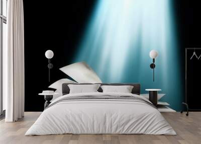 Opened book with bright light beam Wall mural