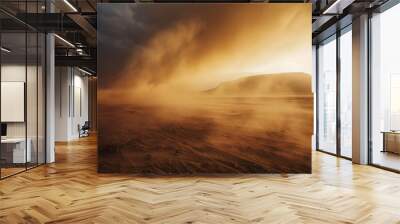 A powerful sandstorm sweeping across a desert landscape, obscuring visibility. Wall mural