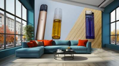 electronic cigarette and refillable liquid with a dividing line between the lighter and cigarette on one side. Wall mural