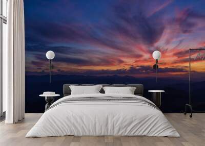 Very beautiful color sunset in the mountains Wall mural