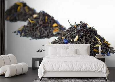 3 heaps of black Earl Grey tea isolated on white Wall mural