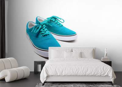 A pair of Blue canvas shoes isolated on white Wall mural