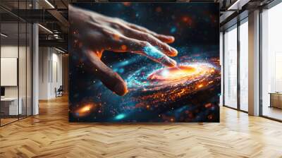 A hand touching a vibrant holographic galaxy display with sparkling stars Wall mural