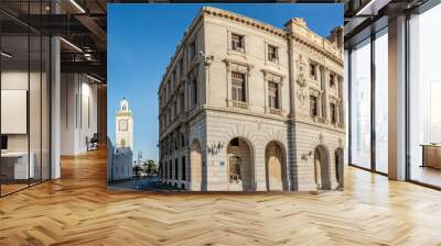 Old building facade with arabic plate says 