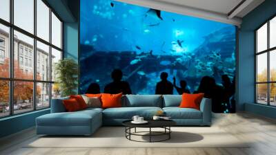 blur abstract people observing fish in aquarium  , Ocean fish in tank Wall mural