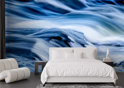 Waterfall into foamy river Wall mural