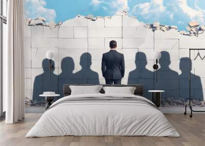 A businessman or executive standing alone in front of a wall of accusing shadows, representing societal condemnation for unethical actions. Laws and penalties for companies with poor governance. Wall mural