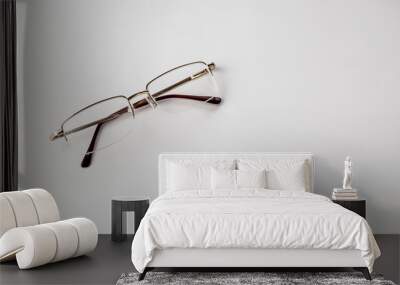 Glasses for vision on a light background. copy space Wall mural