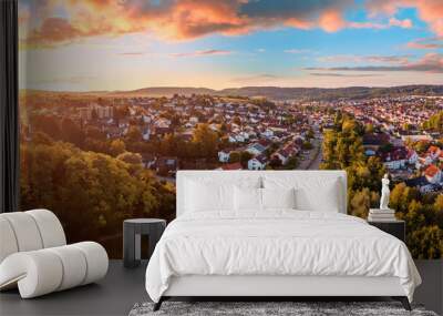 Aerial panorama of a European town at sunrise, with magnificent colorful sky and warm light Wall mural