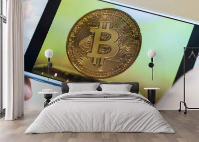 Finance investment business risk. Bitcoin on screen smartphone while Businessman checking photo Gold Bitcoins circuit in mobile for daily check in cryptocurrency. Blockchain idea Wall mural