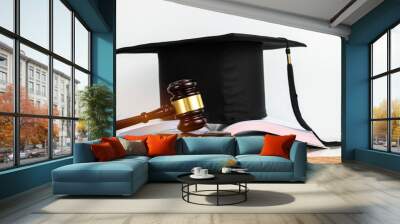 Judge gavel school lawyer on open book in library with diploma hat on wooden desk.Concept of Education Graduation study international legal rights, jurisprudence laws in university Wall mural