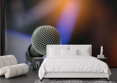 microphone on abstract blurred of speech in seminar room or speaking conference hall light, event co Wall mural