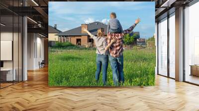 father and son in front of house Wall mural