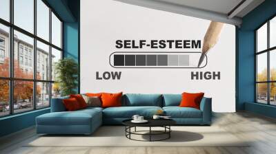 Self-esteem loading written on white paper with pencil. Boosting self esteem concept and improvement idea Wall mural