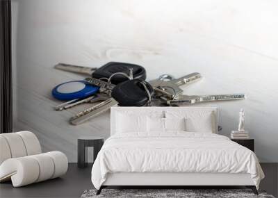 bunch of keys on a white wooden background Wall mural