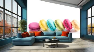 Colorful macarons line isolated on white background Wall mural