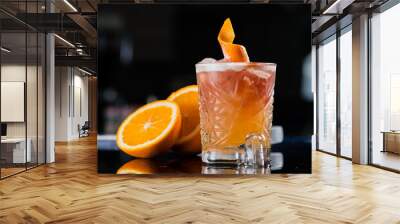 Fresh cocktail with orange and ice. Alcoholic, non-alcoholic dri Wall mural